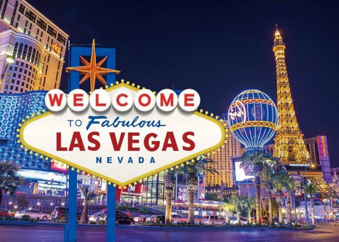Vibrant Las Vegas sign saying welcome to las vegas, with the paris hotel and new your nre york hotel in the background at night. Vicesnob's expert guide on maximizing online casino bonuses, including tips and strategies for players