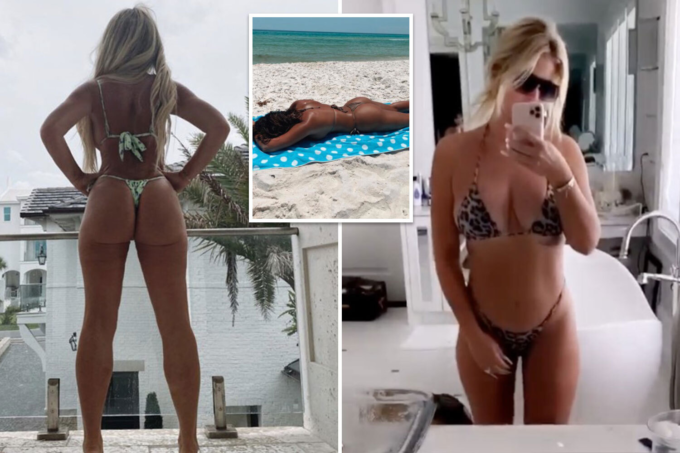 Kim Zolciak-Biermann in a thong bikini standing in front of her mansion and also taking a selfie in her mirror showing off her large delicious breasts