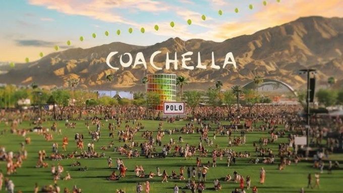 A photo of festival attendees celebrating at Coachella 2026 after both weekends sold out, holding up their digital tickets and passes.