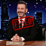 A smiling Jimmy Kimmel sits at his desk on the set of his late-night talk show. A large, red "FIRED" stamp is superimposed diagonally across the image.