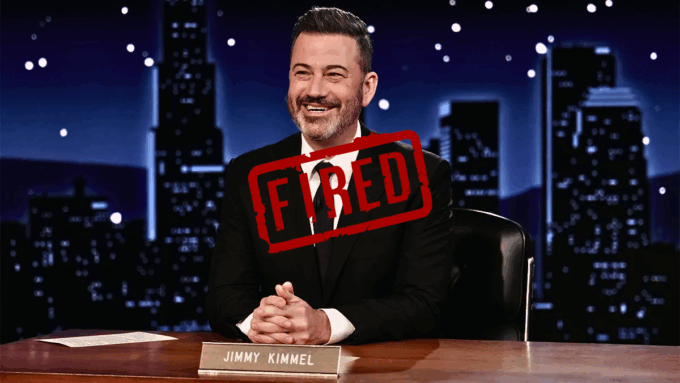 A smiling Jimmy Kimmel sits at his desk on the set of his late-night talk show. A large, red "FIRED" stamp is superimposed diagonally across the image.