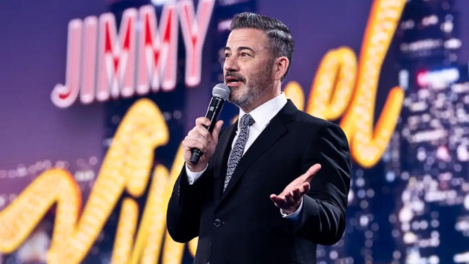 Jimmy Kimmel speaking on stage during his late-night show, amid controversy over declining viewership. Jimmy Kimmel ratings have dropped significantly after political remarks.