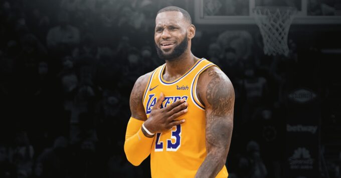 LeBron James reacts during an NBA Lakers game amid coverage of the LeBron James Scandal and gambling controversy.