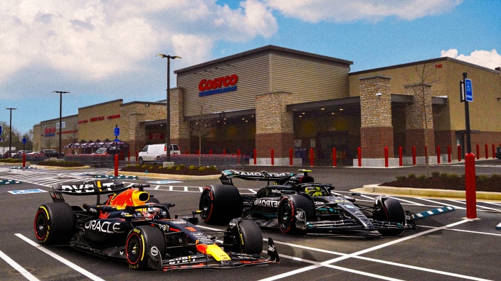 Formula 1 cars parked outside Costco, representing the viral buzz around F1 Las Vegas 2025 ticket packages and racing culture.