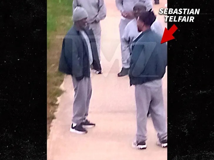 A photo of Sebastian Telfair, identified by a red arrow and text, standing and talking to another man in a prison yard. The image suggests Sebastian Telfair has joined P Diddy in a correctional facility, referencing the P Diddy prison twist.