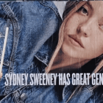 A large outdoor billboard showing a close-up of Sydney Sweeney wearing a denim jacket. A smaller figure of Sydney Sweeney is seen to the left, standing on a lift and holding a tool.