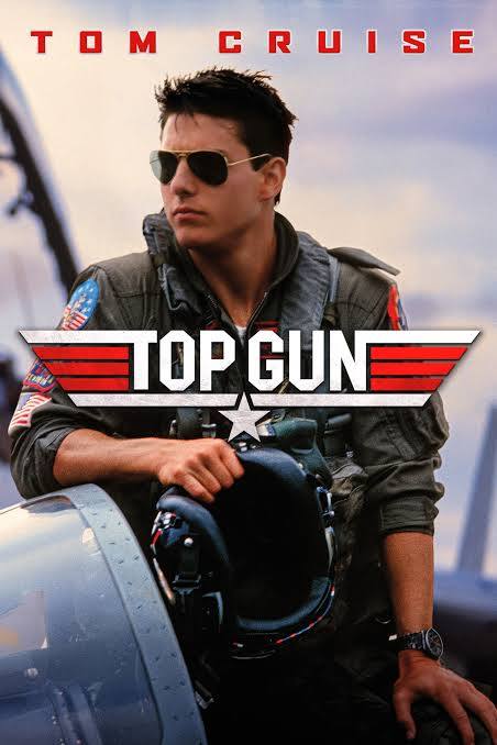 Movie poster for 'Top Gun' featuring a young Tom Cruise as Maverick in a flight suit and aviator sunglasses, holding a helmet.