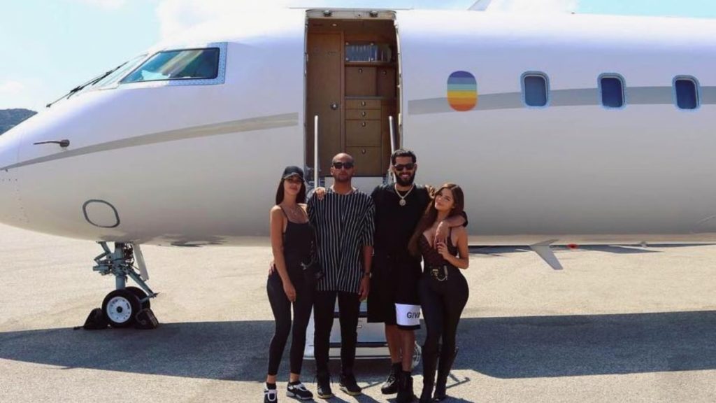 Demi Rose posing with her frineds, taking their first aero