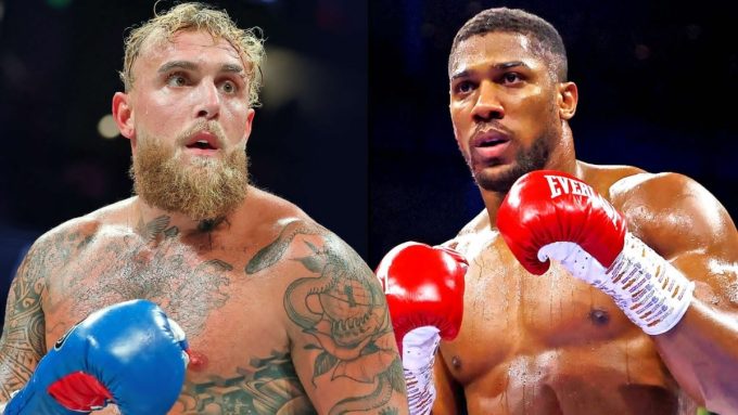 Promotional graphic for the Jake Paul vs Anthony Joshua heavyweight fight in Miami, featuring headshots of both fighters and the headline "Who Won?" to discuss the match results.