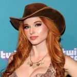 Popular internet personality Amouranth wearing a cowgirl hat and Western attire, representing her Texas roots and versatile content style.