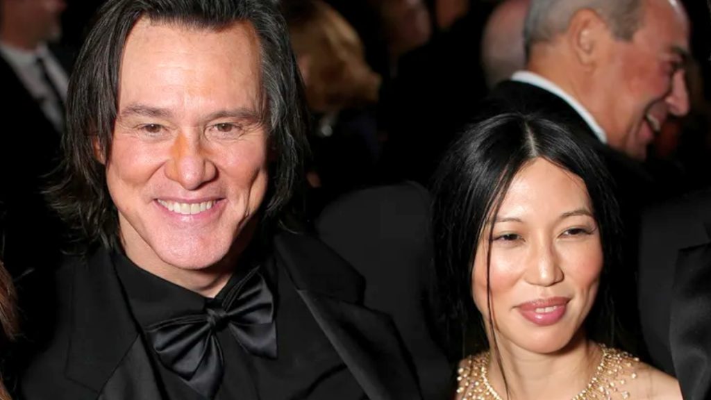 Actor Jim Carrey smiles warmly alongside his companion, Min Ah, during the César Awards ceremony in France.