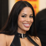 Model Luna Star smiling in a professional studio portrait