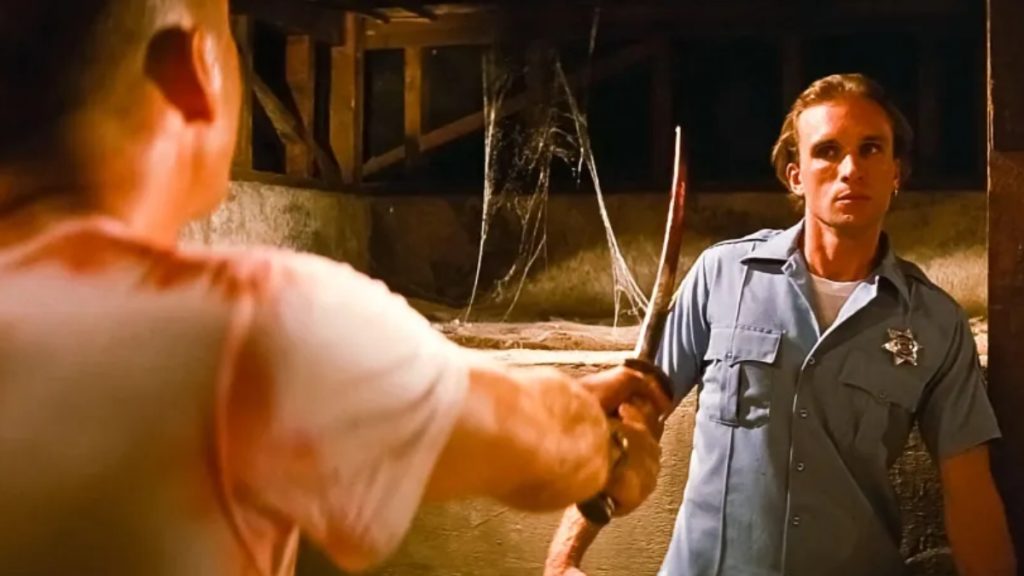 A dramatic thumbnail titled "'Pulp Fiction' Star Peter Greene Dies in Shocking Accident." It features a split-screen: one side shows Greene as his iconic character Zed from Pulp Fiction