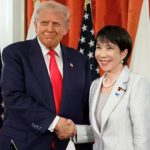 President Donald Trump and Japanese Prime Minister Sanae Takaichi are pictured during a formal meeting at the Akasaka Palace in Tokyo. They are seated at a large conference table with their respective delegations, following the announcement of a $36 Billion US Investment from Japan as the first tranche of a larger trade agreement.