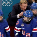 An image showing members of the US Women's Hockey Team in their Team USA gear, used to illustrate news reports about the team declining an initial invitation to the 2026 State of the Union due to scheduling conflicts.