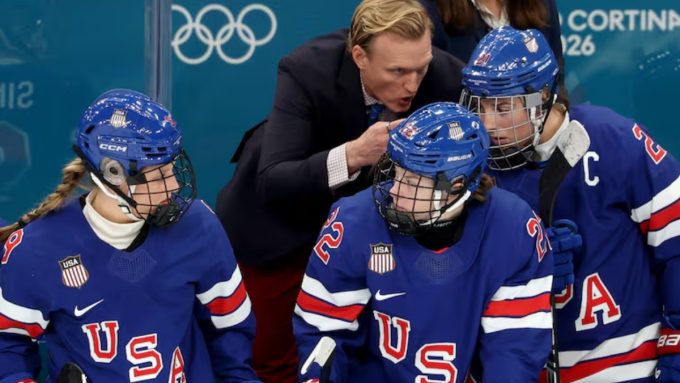 An image showing members of the US Women's Hockey Team in their Team USA gear, used to illustrate news reports about the team declining an initial invitation to the 2026 State of the Union due to scheduling conflicts.