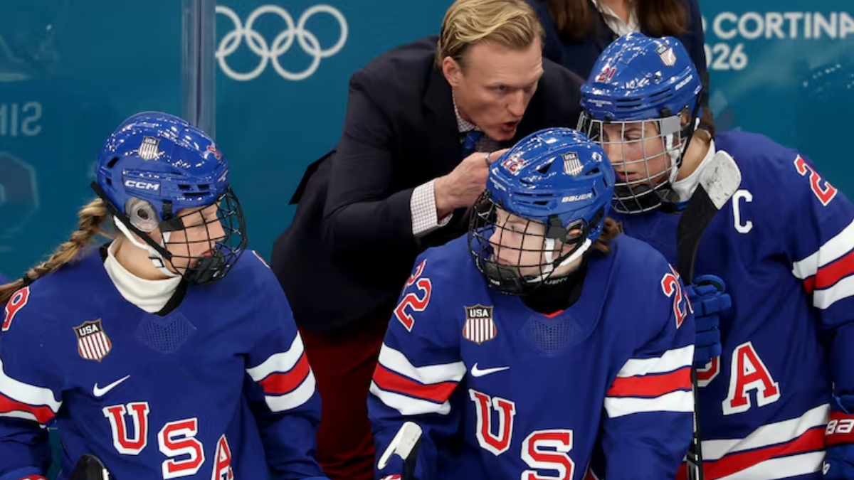 An image showing members of the US Women's Hockey Team in their Team USA gear, used to illustrate news reports about the team declining an initial invitation to the 2026 State of the Union due to scheduling conflicts.