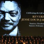 A large commemorative screen displays a portrait of Reverend Jesse Louis Jackson, Sr., noting his birth on October 8, 1941, and his passing on February 17, 2026, as a choir gathers for the Jesse Jackson Funeral.