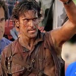 A composite image featuring three different versions of Bruce Campbell. One version wears a floral shirt, the center version is covered in grime and blood from an action role, and the third is dressed as an Elvis impersonator in a blue jumpsuit.