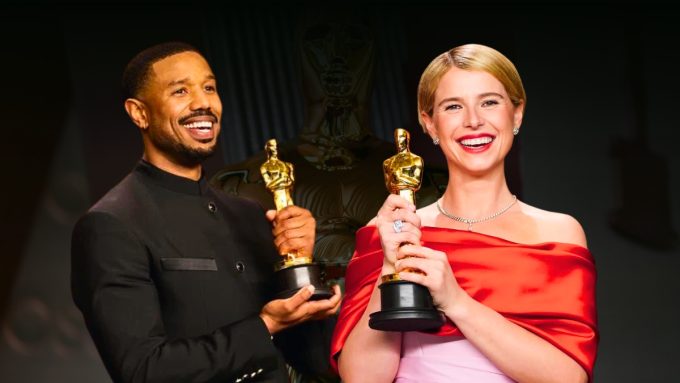 A celebratory side-by-side shot of Michael B. Jordan and Jessie Buckley holding their Academy Awards. Michael B. Jordan, smiling broadly, wears a black military-style suit with a high collar. Jessie Buckley beams in a vibrant red off-the-shoulder gown paired with a dainty diamond necklace and her signature blonde bob.