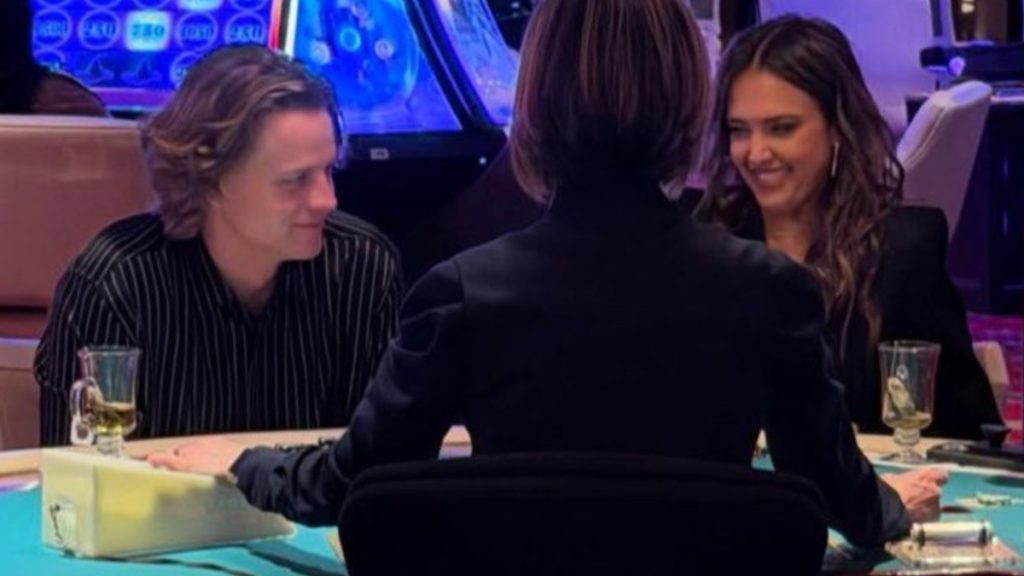 Collage of photos featuring quarterback Joe Burrow and actress Jessica Alba, including a side-by-side pose in a casino and a photo sitting at a blackjack table with another person, taken at an event in 2026.