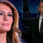 A side-by-side composite image featuring a close-up of Jimmy Kimmel and Melania Trump. On the left, Melania Trump is shown in a headshot with a neutral expression, wearing a large sparkling earring. On the right, Jimmy Kimmel is pictured in a black suit and tie against a late-night talk show backdrop featuring a stylized city skyline at night.