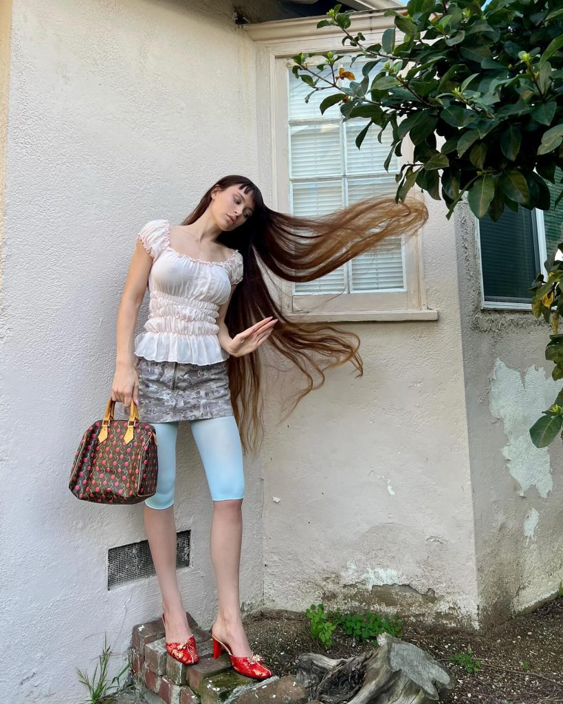 Lana Rhoades posed in open hair