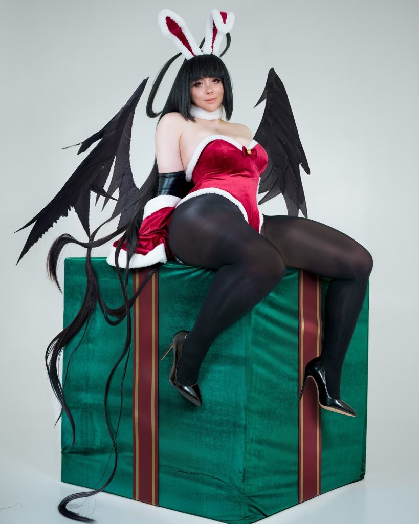 Mariah Mallad (Momokun) wearing a holiday-themed Sexy Anime Cosplay outfit with wings