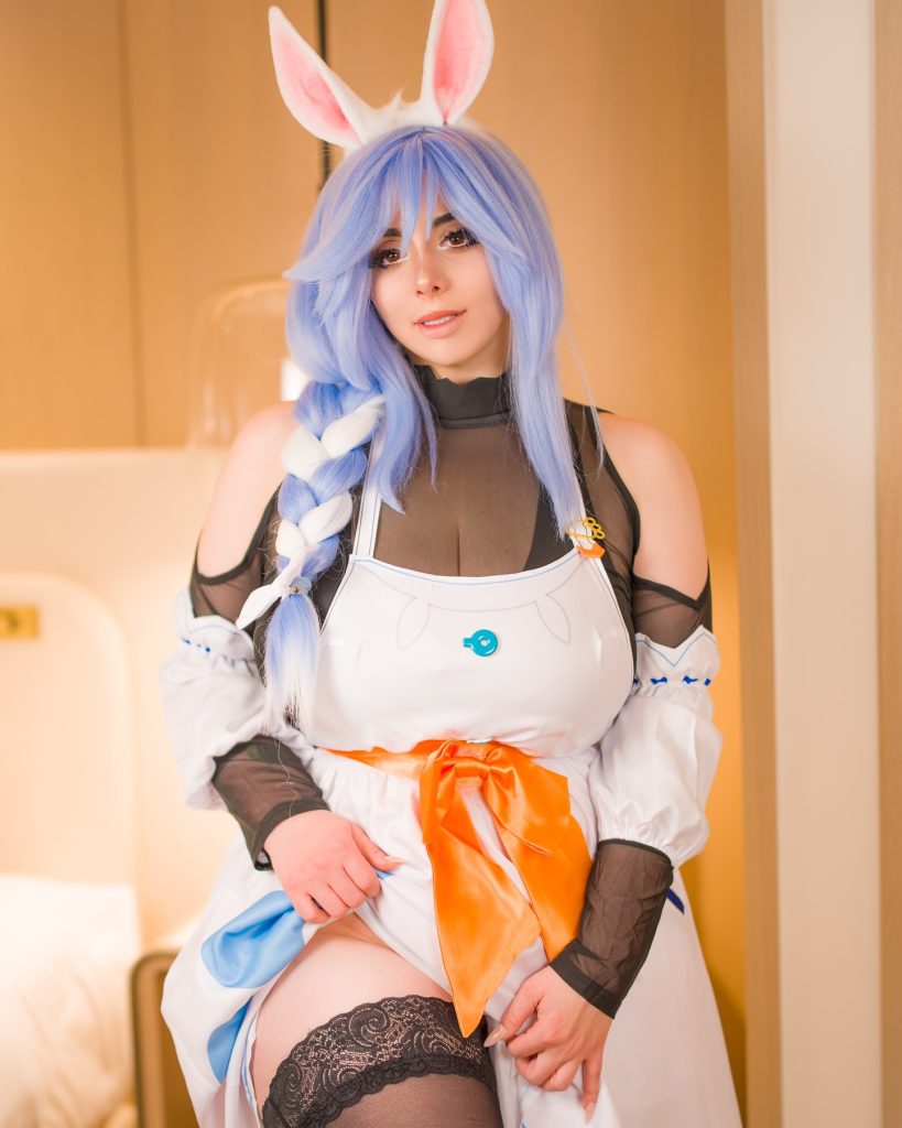 Mariah Mallad (Momokun) in a Sexy Anime Cosplay costume with rabbit ears.