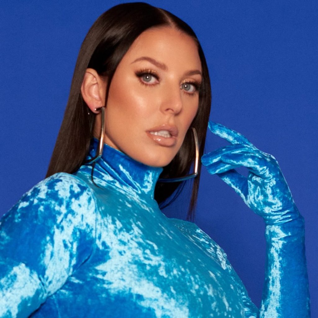 Portrait of Angela White wearing a blue velvet top, often featured among the best OnlyFans to buy subscriptions for exclusive content.