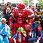 A large group of X-Men cosplayers showcasing dynamic group suits, highlighting top cosplay trends at anime and comic conventions.