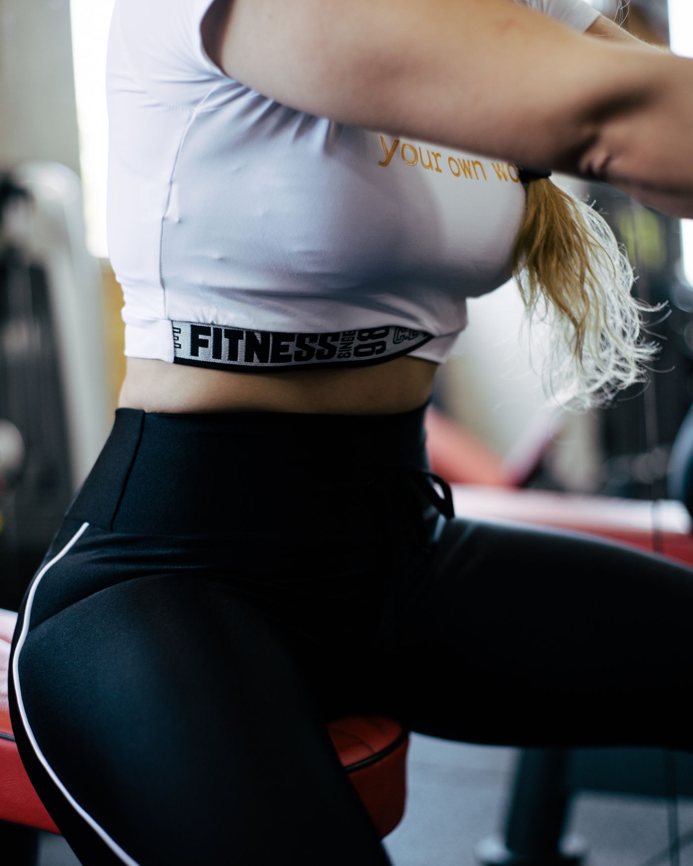Close-up of gym activewear representing OnlyFans subscription pricing tiers in 2026