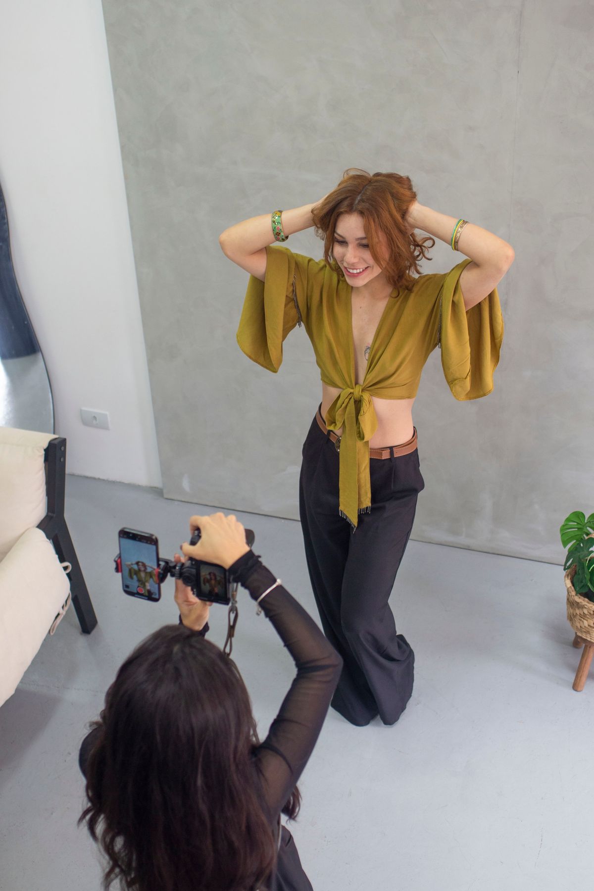 Professional fashion photoshoot in modern studio setting