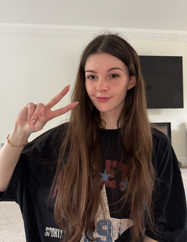 A selfie showing streamer F1NN5TER, known for cross-dressing and streaming content popular on platforms like Nerdy OnlyFans
