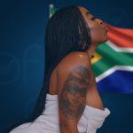 Visual representation of South Africa OnlyFans market earnings showing a content creator against the national flag.