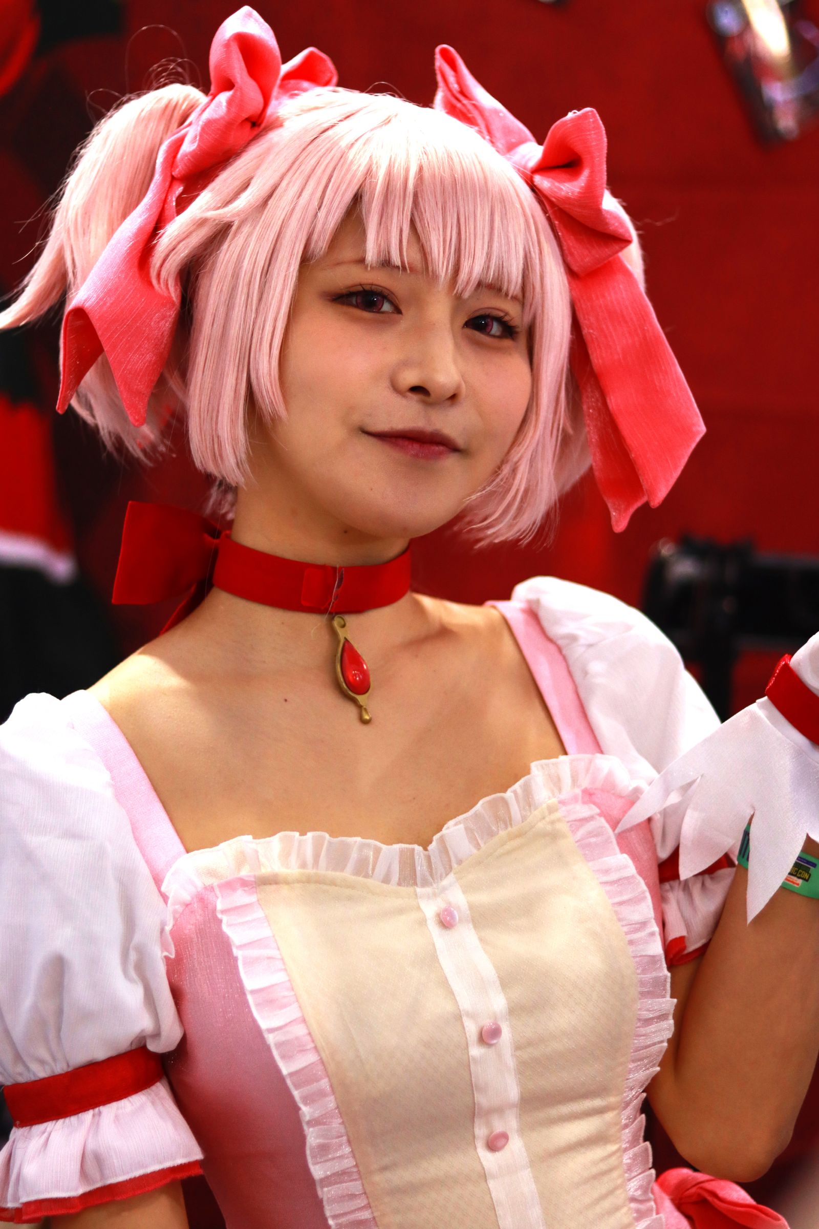Cosplayer in costume at an anime convention, a core scene for nerdy OnlyFans creators